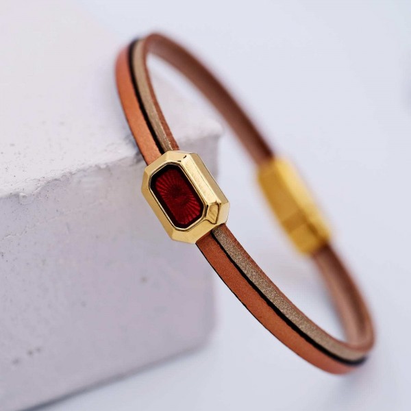 Leather bracelet with enamel and metal parts in gold-plating